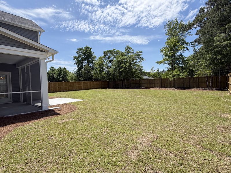 Exterior details and patio area of a home in Sawyer’s Run, Hampstead (Image 25).