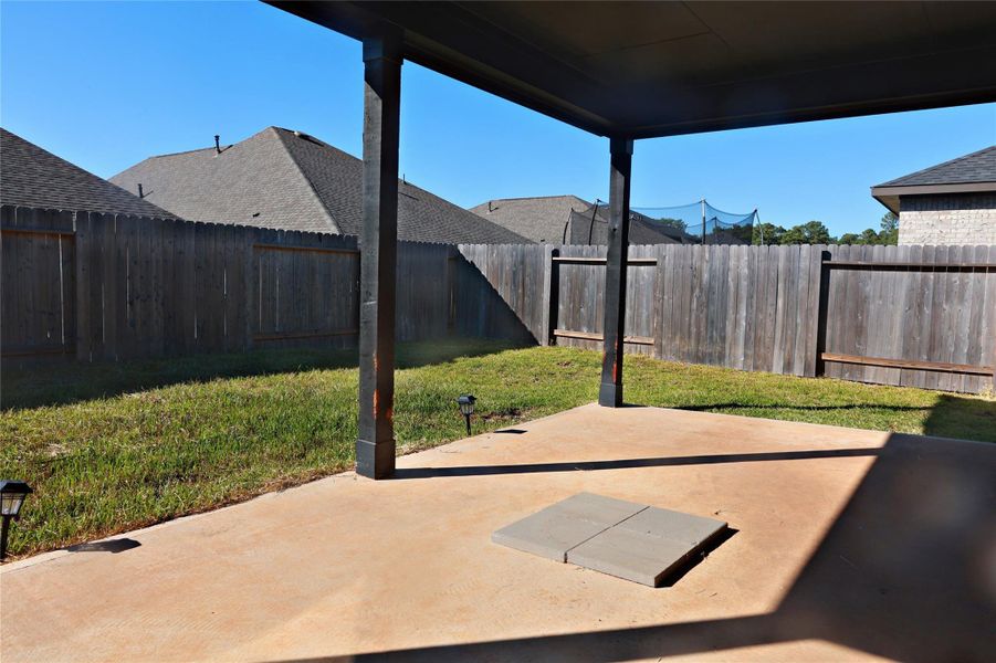 Exterior details and patio area of a home in , Magnolia (Image 2). Exterior details and patio area of a home in , Magnolia (Image 2).
