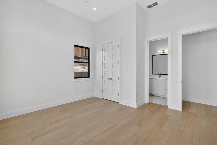 Spacious, unfurnished interior of a new home in Milky Way at River Place, Austin (Image 17).