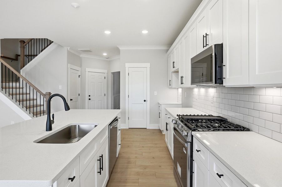 Furnished interior view inside a new home in Blythe Mill Townhomes, Waxhaw (Image 10). Furnished interior view inside a new home in Blythe Mill Townhomes, Waxhaw (Image 10).
