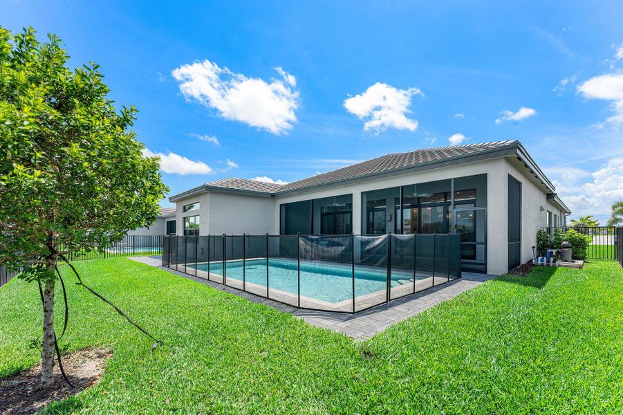 Exterior details and patio area of a home in Valencia Grand, Boynton Beach (Image 3). Exterior details and patio area of a home in Valencia Grand, Boynton Beach (Image 3).