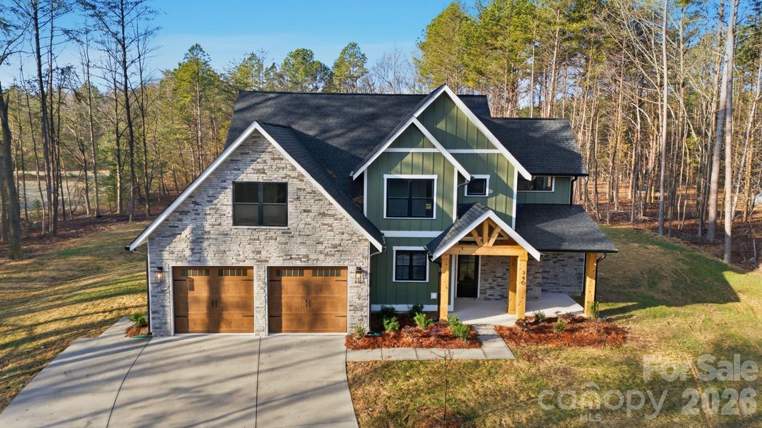 Front exterior of a new home in , Crouse, NC, highlighting curb appeal (Image 26).