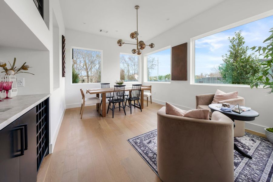 Dedicated dining room with form sitting area