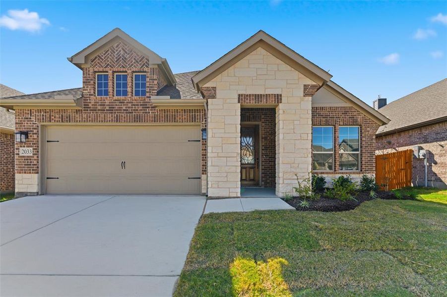 Front exterior of a new home in Northstar, Haslet, TX, highlighting curb appeal (Image 2).