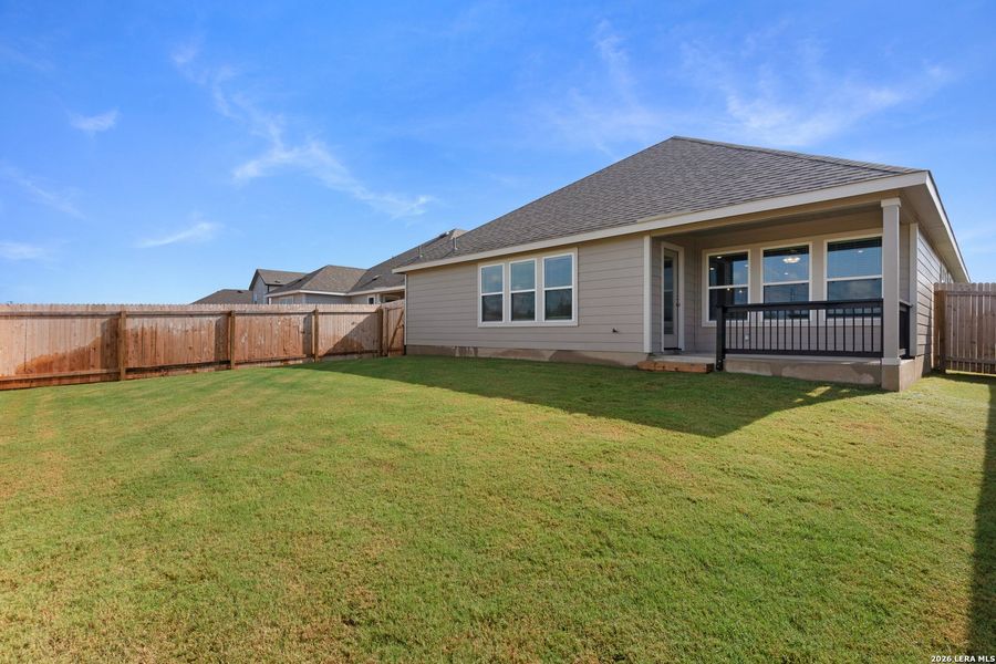 Exterior details and patio area of a home in Prairie Green, Converse (Image 3).