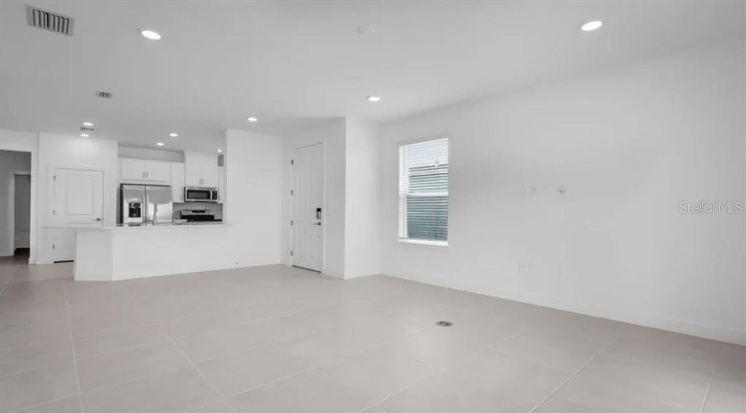 Spacious, unfurnished interior of a new home in The Cove at West Port, Port Charlotte (Image 15).