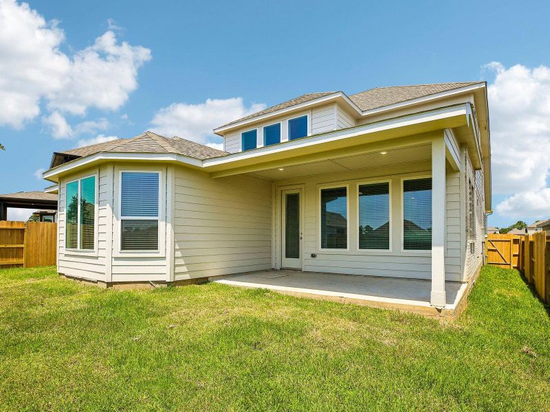 Exterior details and patio area of a home in Pine Lake Cove - Classic Series, Montgomery (Image 3).