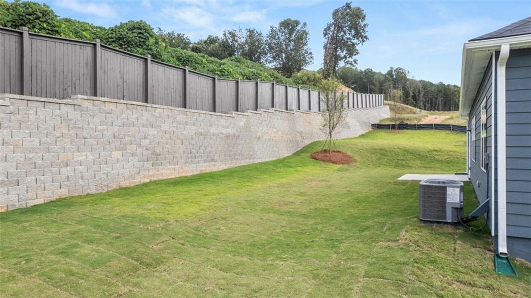 Exterior details and patio area of a home in Brooks Station, Dacula (Image 18). Exterior details and patio area of a home in Brooks Station, Dacula (Image 18).