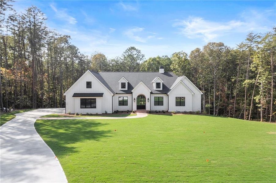 Front exterior of a new home in , Ball Ground, GA, highlighting curb appeal (Image 30).