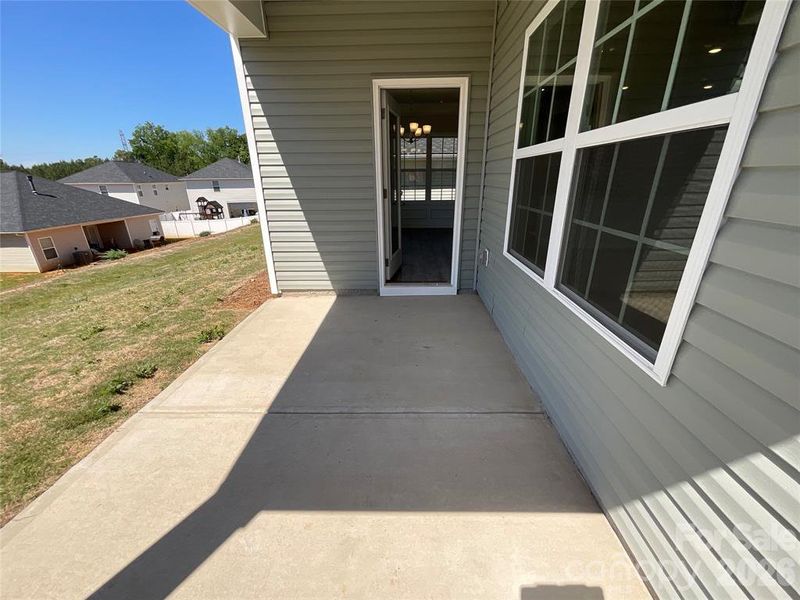Exterior details and patio area of a home in Village at Parkside, Gastonia (Image 18).