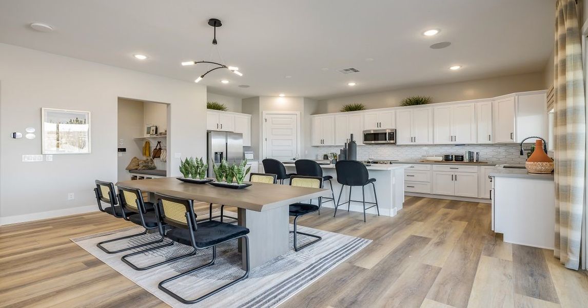 Representative furnished interior of a home built from the Camelback by William Ryan Homes in Alta Vida at Westpark, Buckeye (Image 5).