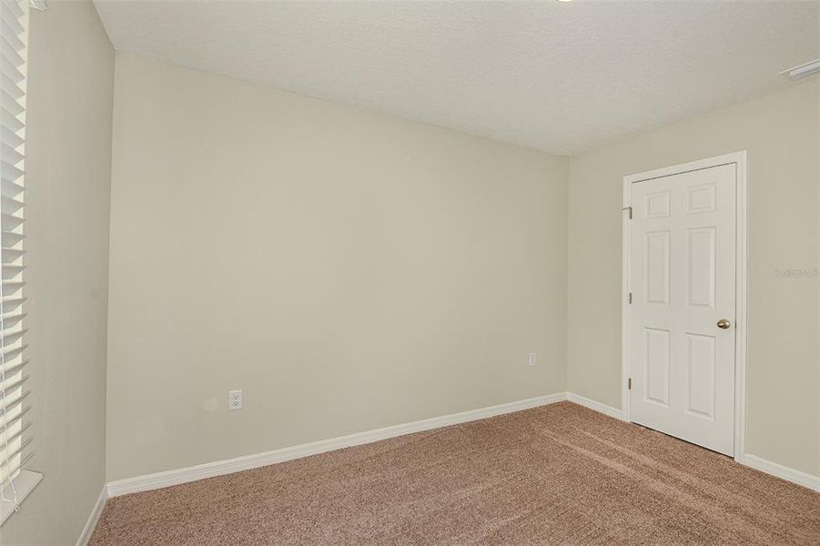 Spacious, unfurnished interior of a new home in Scenic Terrace, Haines City (Image 24).