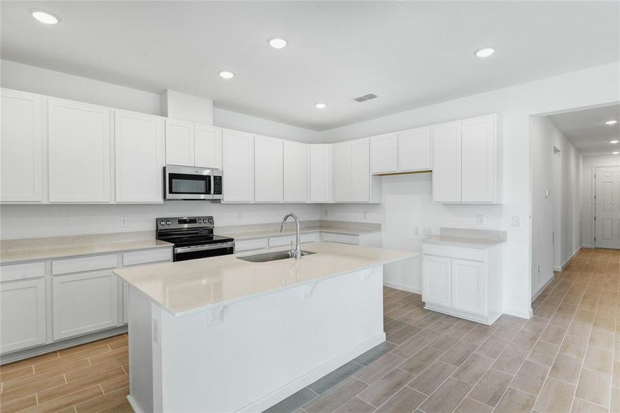 Furnished interior view inside a new home in Seasons at Grandview Gardens, Deland (Image 8).