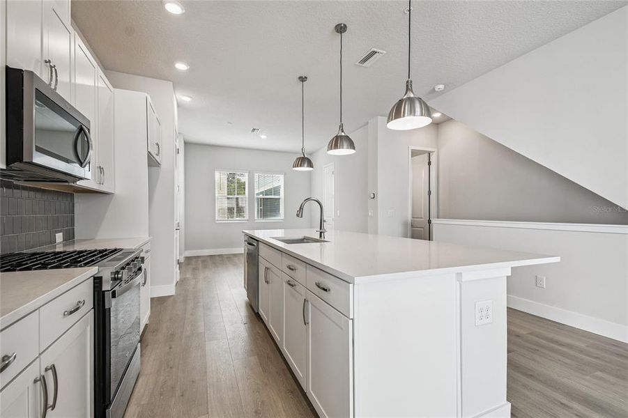 Furnished interior view inside a new home in Apex at Seminole Heights, Tampa (Image 20). Furnished interior view inside a new home in Apex at Seminole Heights, Tampa (Image 20).