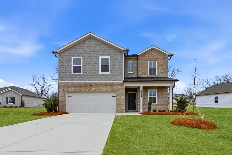 Front exterior of a new home in The Orchard, Perry, GA, highlighting curb appeal (Image 1). Front exterior of a new home in The Orchard, Perry, GA, highlighting curb appeal (Image 1).