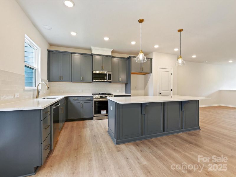 Furnished interior view inside a new home in North Creek Village - Townhomes, Huntersville (Image 4). Furnished interior view inside a new home in North Creek Village - Townhomes, Huntersville (Image 4).