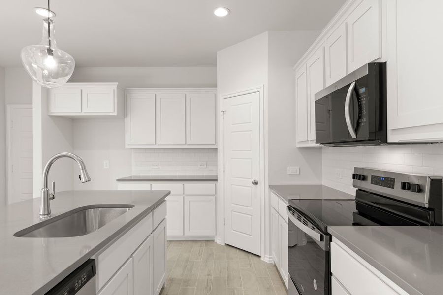 Representative exterior photo of a completed home built from the Maple by Impression Homes in Bryant Farms, Melissa, TX (Image 7). Representative exterior photo of a completed home built from the Maple by Impression Homes in Bryant Farms, Melissa, TX (Image 7).