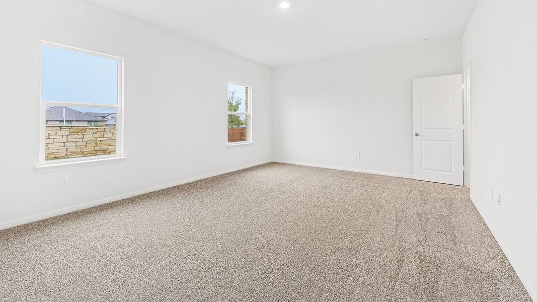 Spacious, unfurnished interior of a new home in Bar W Ranch, Leander (Image 28).