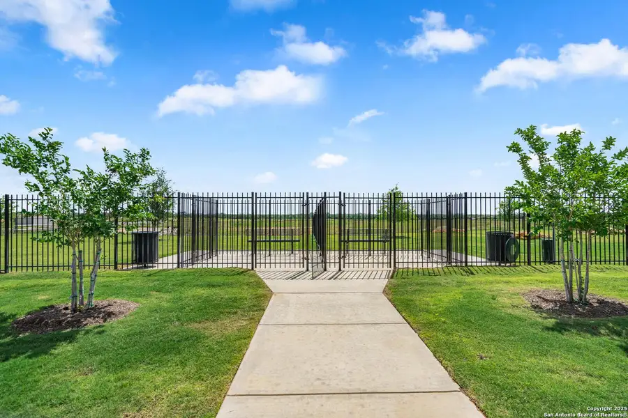 Front exterior of a new home in Rosewood Estates, Lytle, TX, highlighting curb appeal (Image 12).