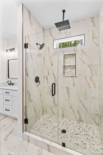 Tiled Shower in main Bath. Tiled Shower in main Bath.