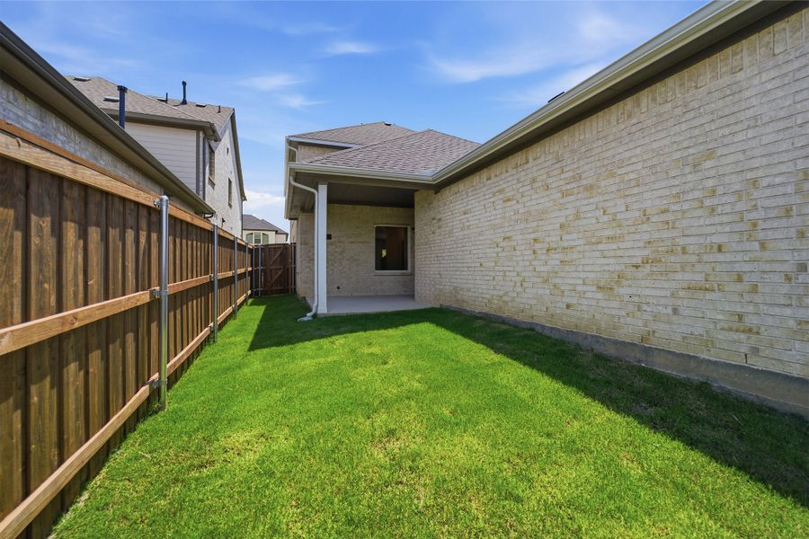 Exterior details and patio area of a home in La Terra, Celina (Image 22). Exterior details and patio area of a home in La Terra, Celina (Image 22).