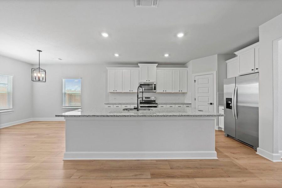 Furnished interior view inside a new home in Whisper Valley, Manor (Image 5).