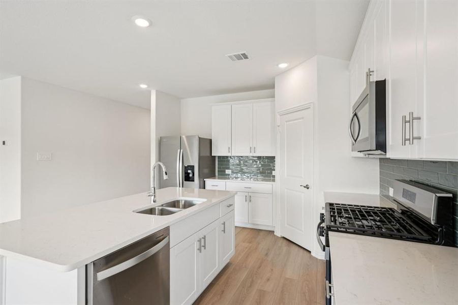 Photo is not of the actual home, but is an inspirational photo of builder’s model home and may depict options, furnishings, and/or decorator features that are not included.