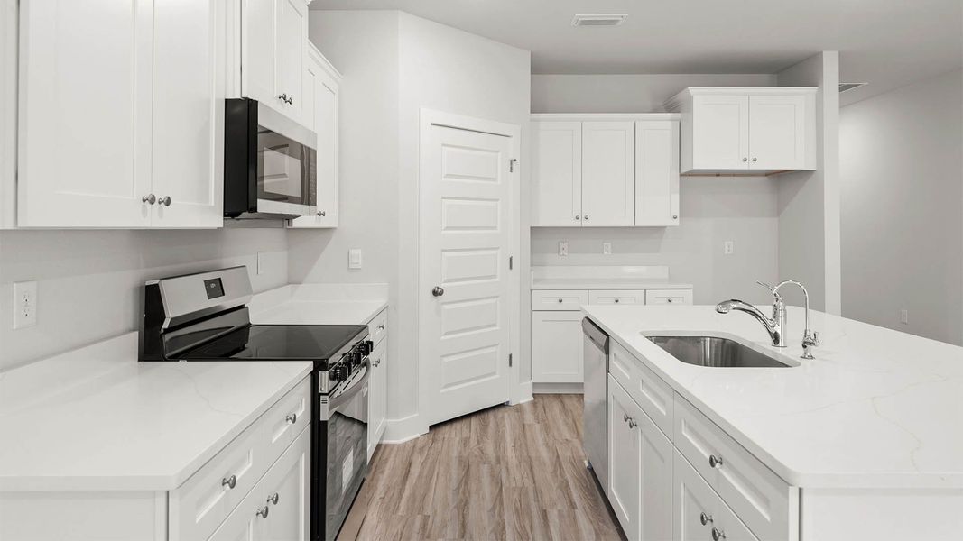 Furnished interior view inside a new home in Buffer Farms, Port Saint Joe (Image 6).