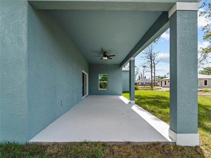 Exterior details and patio area of a home in , North Port (Image 23).