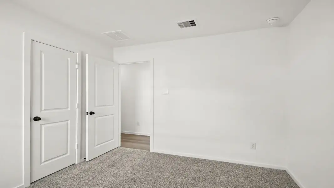Spacious, unfurnished interior of a new home in The Canopies, Splendora (Image 15).