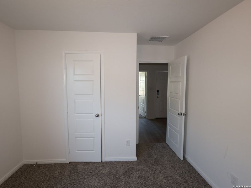 Spacious, unfurnished interior of a new home in Hunters Ranch, San Antonio (Image 34).