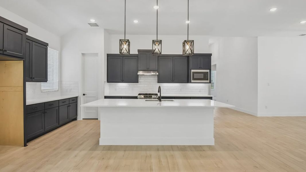 Furnished interior view inside a new home in Artavia, Conroe (Image 9).