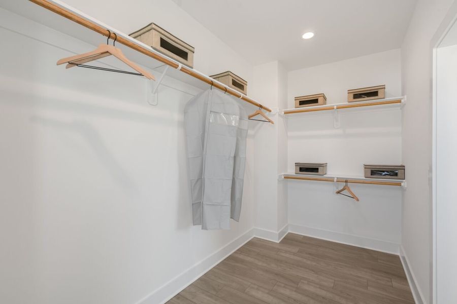 Primary Suite Closet One Primary Suite Closet One