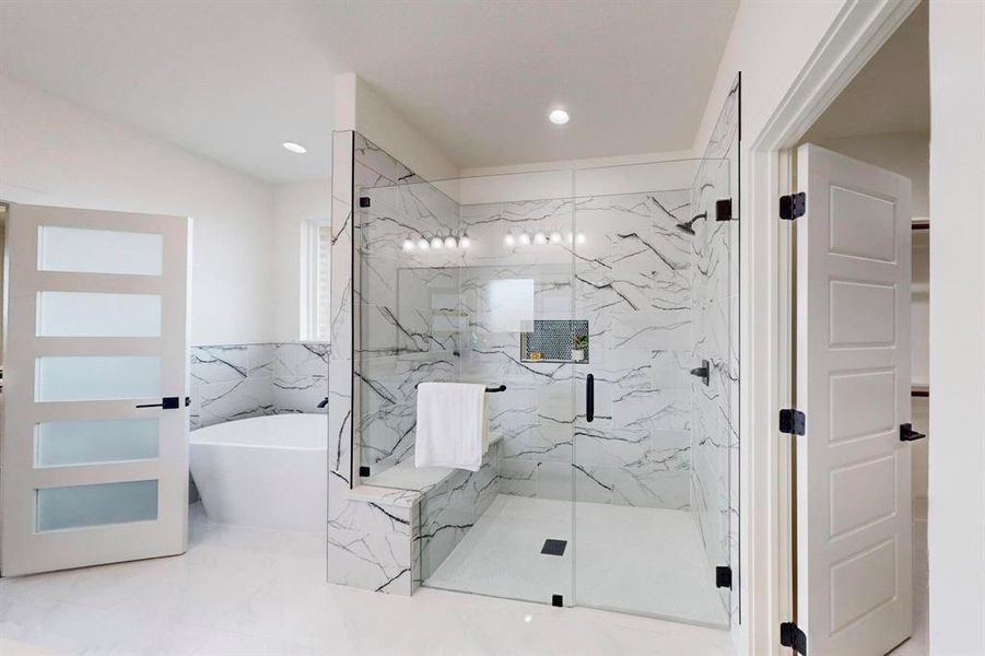 Bathroom with separate shower and tub and tile walls