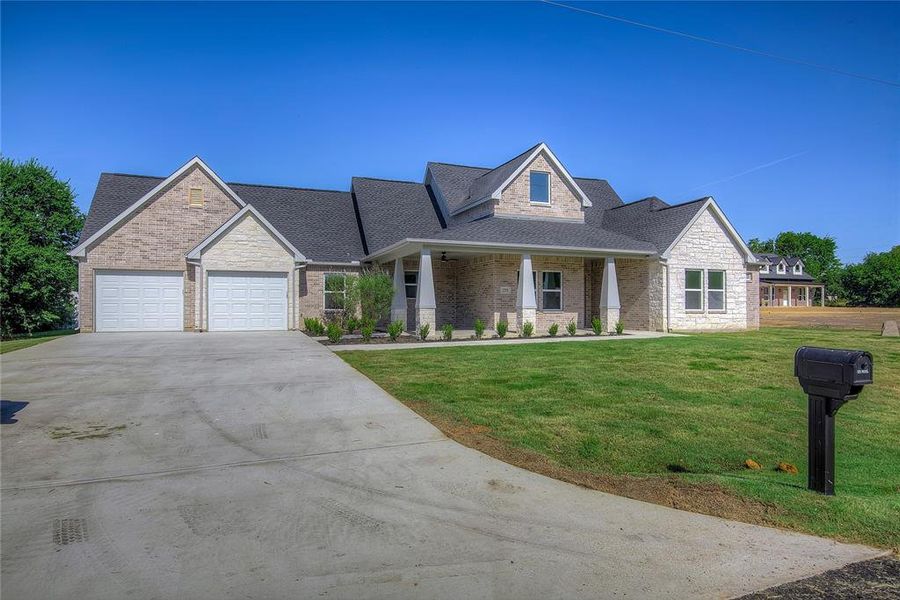 Front exterior of a new home in , Farmersville, TX, highlighting curb appeal (Image 18).