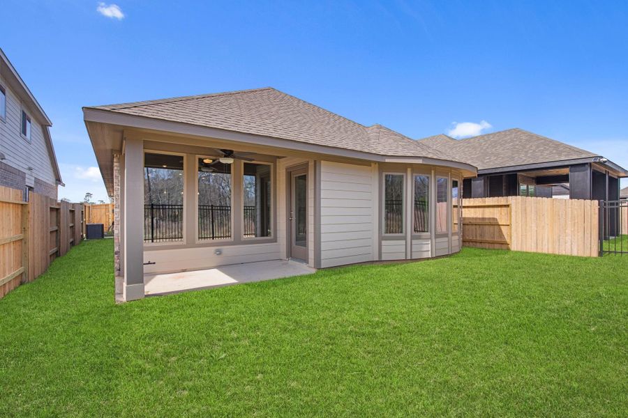 Exterior details and patio area of a home in Grand Central Park, Conroe (Image 21).