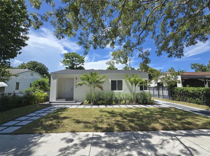 Front exterior of a new home in , Miami, FL, highlighting curb appeal (Image 24).