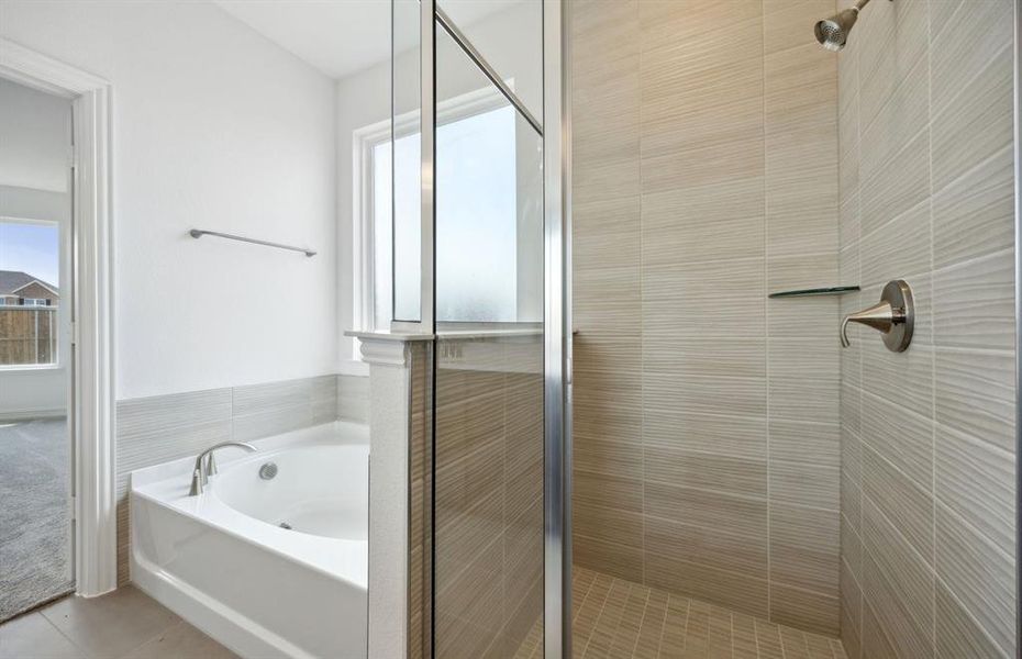 Owner's bath with oversized shower*real home pictured