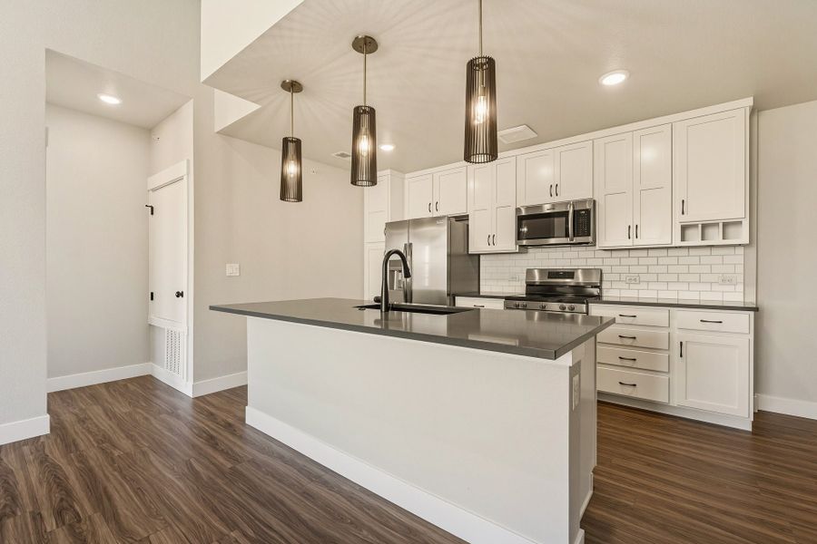 Furnished interior view inside a new home in The Lakes at Centerra - North Shore Flats, Loveland (Image 1).