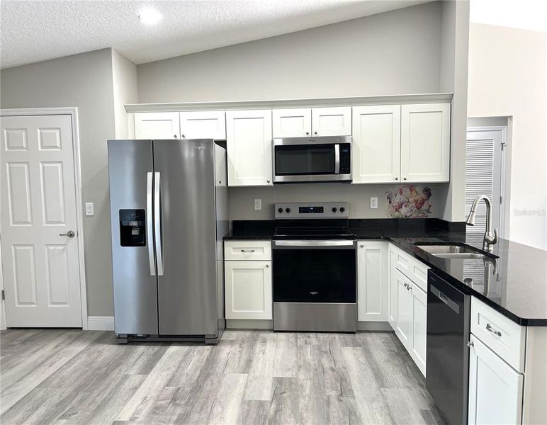 Furnished interior view inside a new home in , Dunnellon (Image 26).