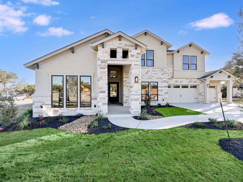 Representative exterior photo of a completed home built from the Topaz II by Giddens Homes in Riverstone, Georgetown, TX (Image 27).