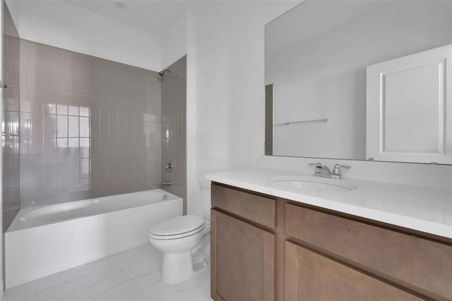 Furnished interior view inside a new home in Serenade at Ovation, Winter Garden (Image 9). Furnished interior view inside a new home in Serenade at Ovation, Winter Garden (Image 9).