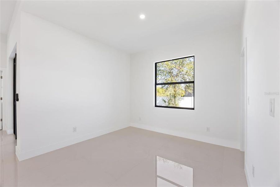 Spacious, unfurnished interior of a new home in , Port Charlotte (Image 36).