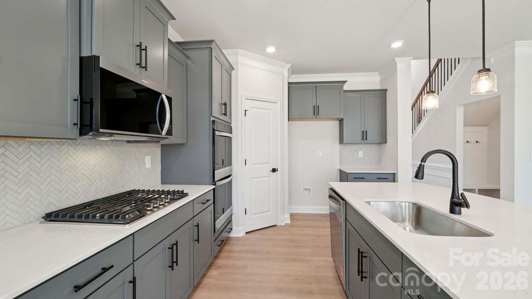 Furnished interior view inside a new home in Sylvan Creek, Denver (Image 5).