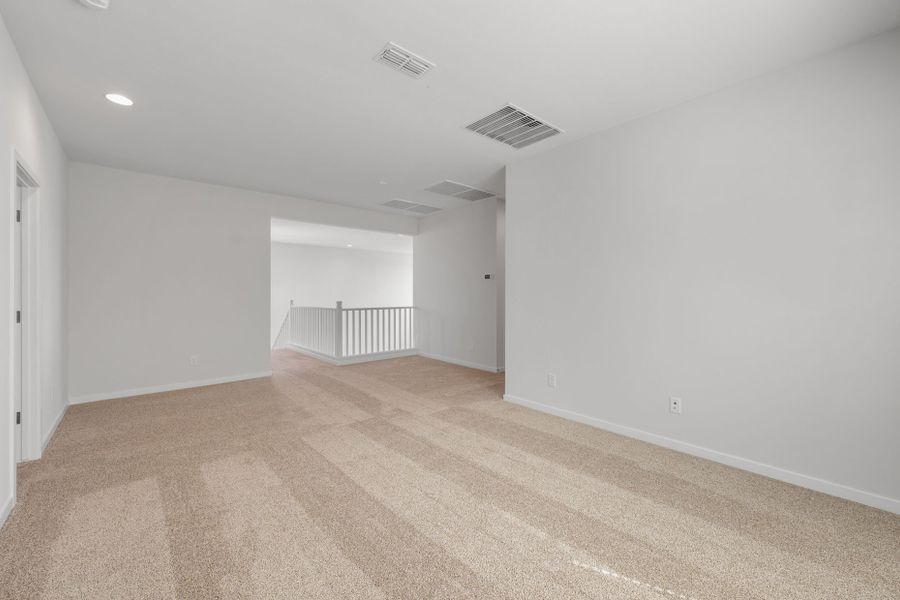 Spacious, unfurnished interior of a new home in Blossom Rock, Apache Junction (Image 30).
