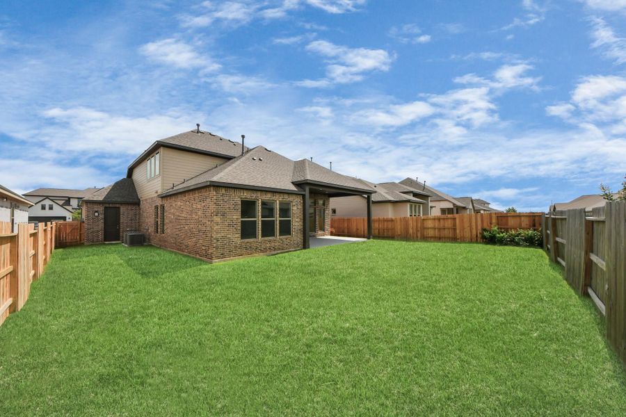 Front exterior of a new home in Marvida, Cypress, TX, highlighting curb appeal (Image 18).