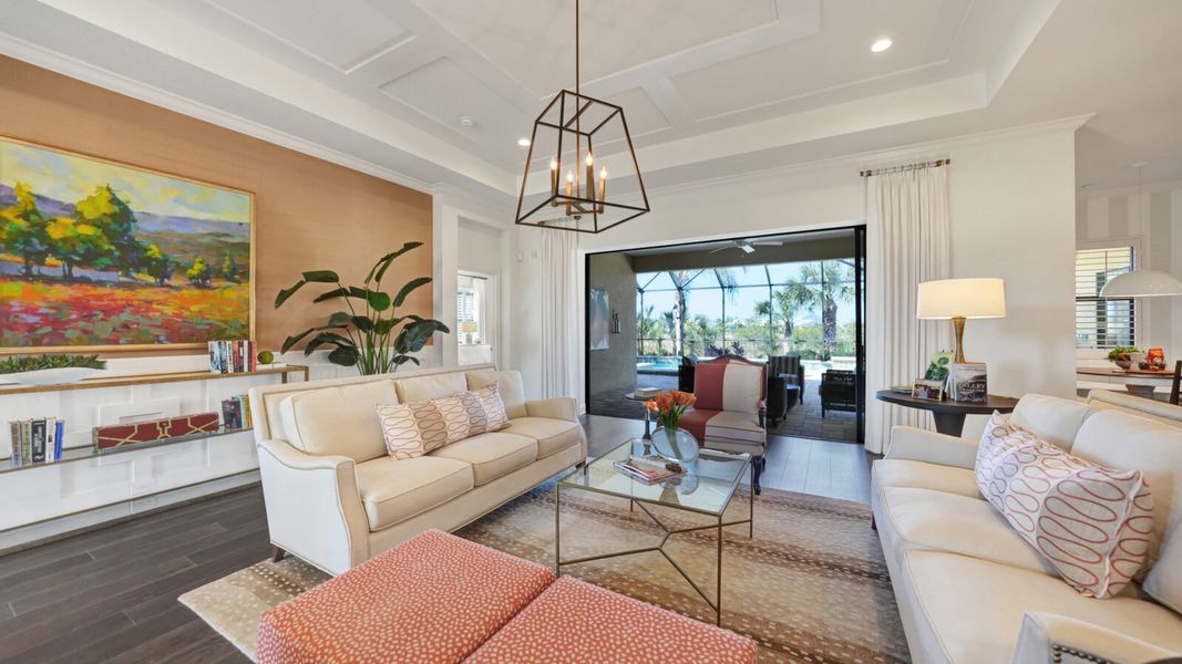 Representative furnished interior of a home built from the Sanibel 2 by Neal Communities in SkySail, Naples (Image 13).