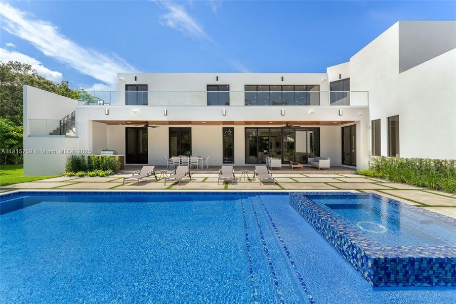 Front exterior of a new home in , Pinecrest, FL, highlighting curb appeal (Image 27).
