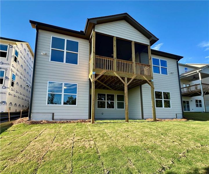 Exterior details and patio area of a home in Twin Lakes, Hoschton (Image 2).