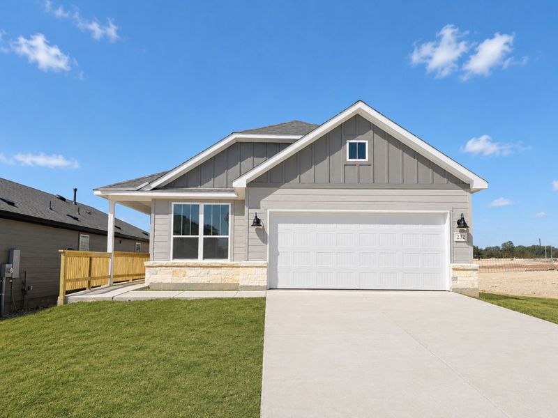 Front exterior of a new home in Corley Farms, Boerne, TX, highlighting curb appeal (Image 2). Front exterior of a new home in Corley Farms, Boerne, TX, highlighting curb appeal (Image 2).